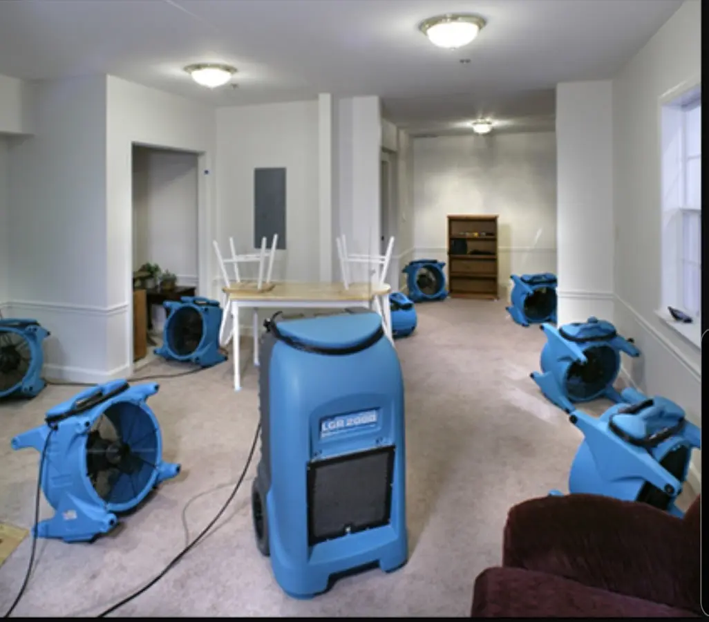 Air movers and dehumidifier setup for Water Damage Restoration in New Lenox